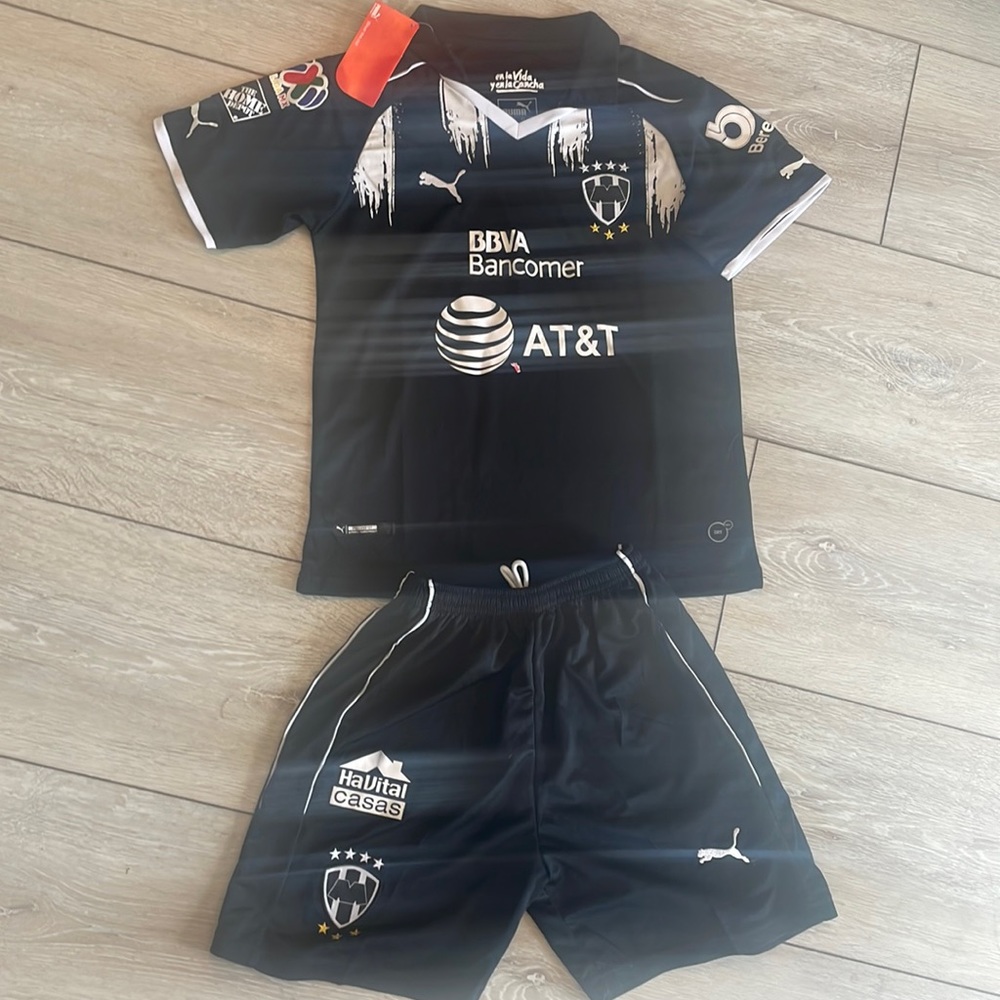 New Puma soccer shorts and shirt set. Youth small. Gift for soccer fan.